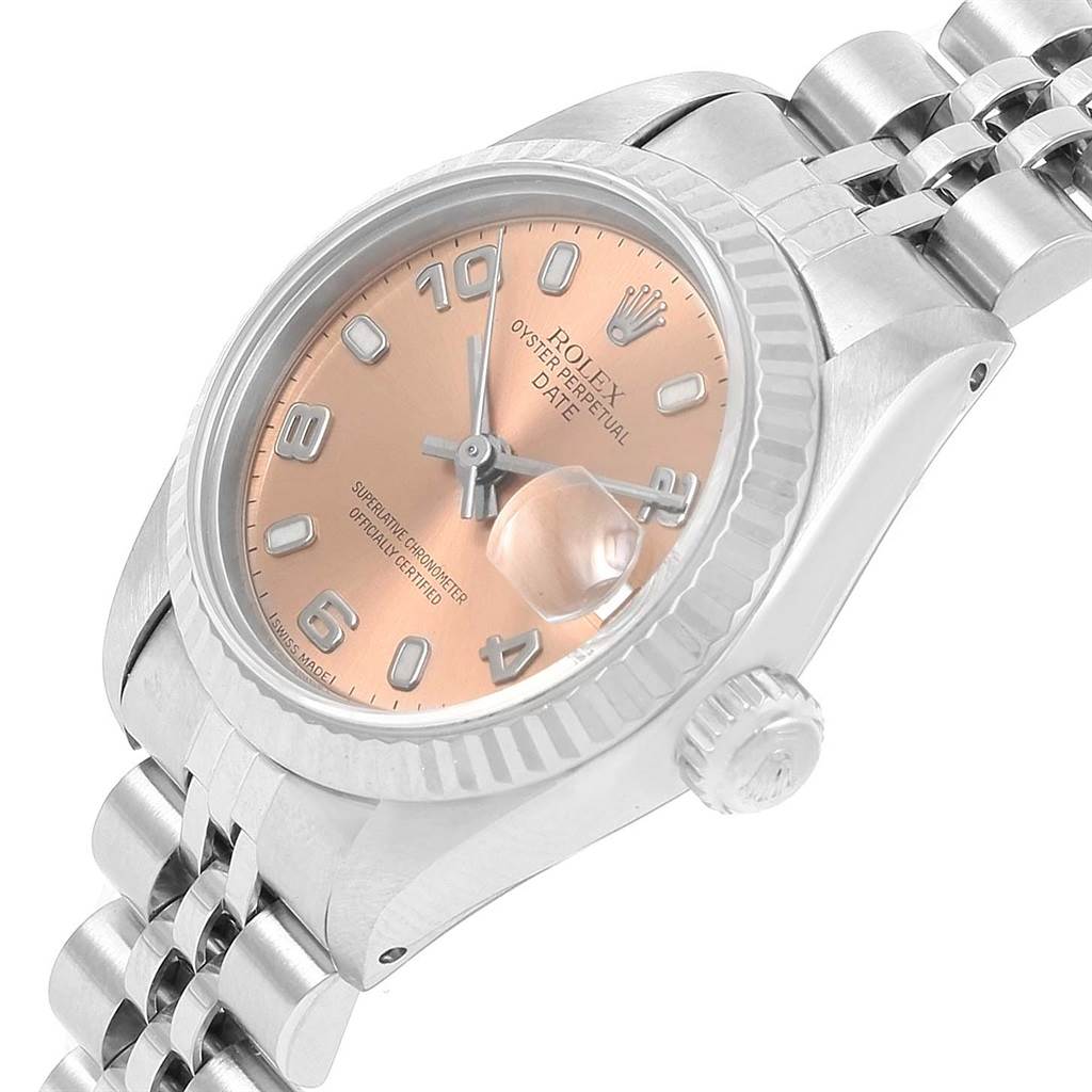 The image shows a Rolex Datejust 69174 Women's Stainless Steel Pink Dial 69174 Women's Stainless Steel Pink Dial watch from a diagonal side angle, highlighting its bezel, crown, jubilee bracelet, and peach dial.