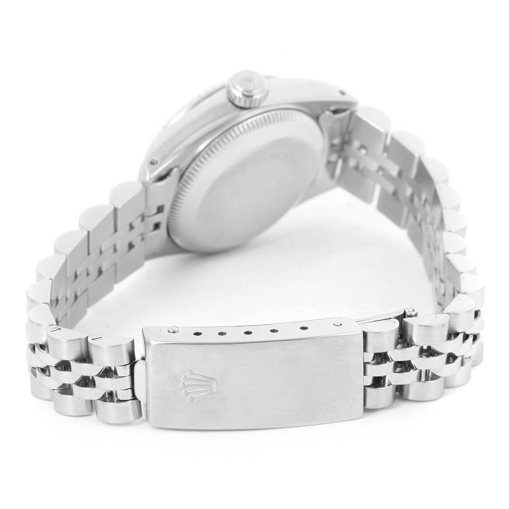 This image shows the bracelet, clasp, and case back of a Rolex Datejust 69174 Women's Stainless Steel Pink Dial 69174 Women's Stainless Steel Pink Dial watch at an angled rear view.