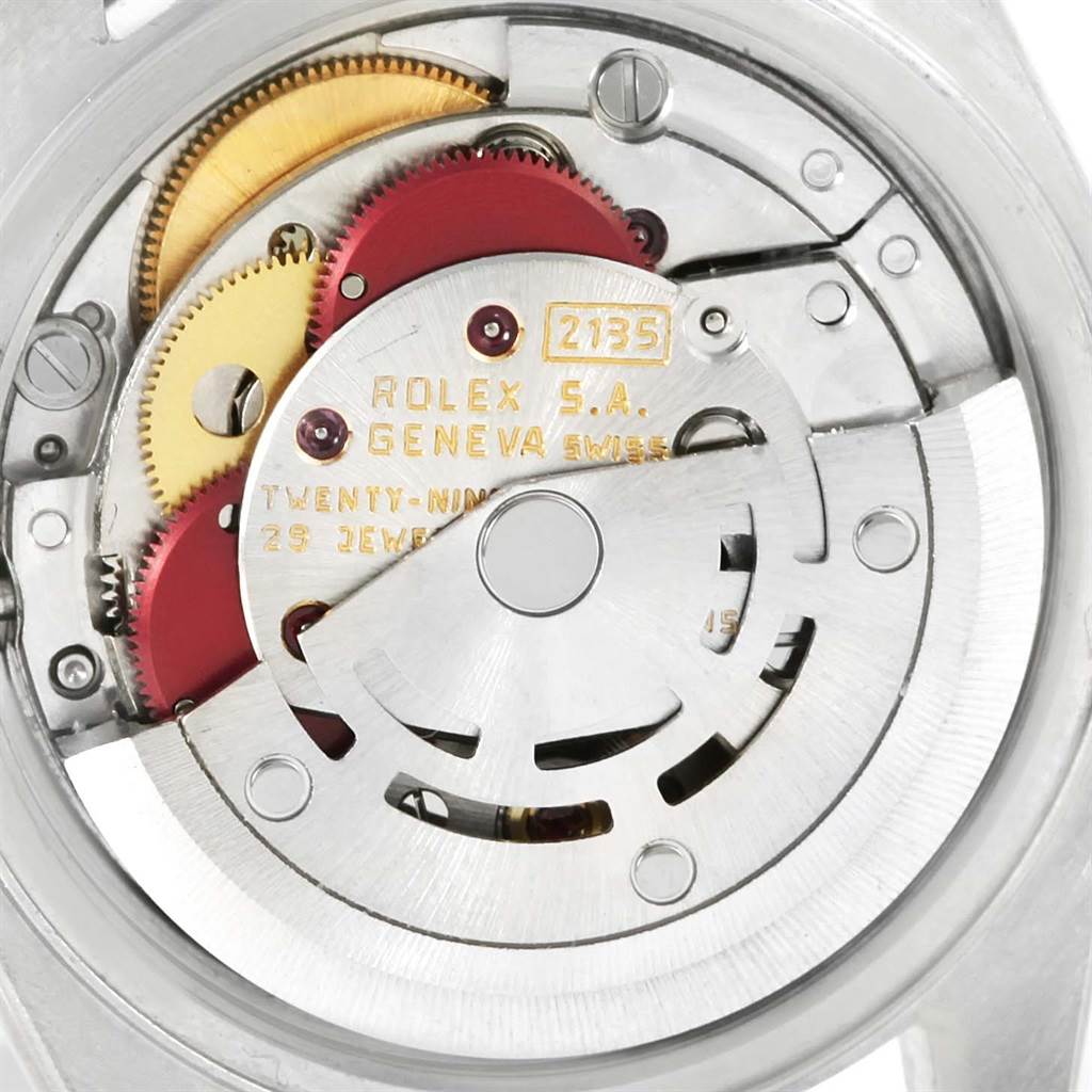 This image displays the inner movement of a Rolex Datejust 69173 Women's Stainless Steel Beige Dial 69173 Women's Stainless Steel Beige Dial watch, highlighting gears and mechanisms.