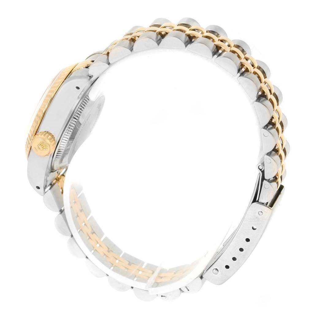 The image shows a side view of a Rolex Datejust 69173 Women's Stainless Steel Beige Dial 69173 Women's Stainless Steel Beige Dial watch, highlighting the crown, case, and Jubilee bracelet in steel and gold.