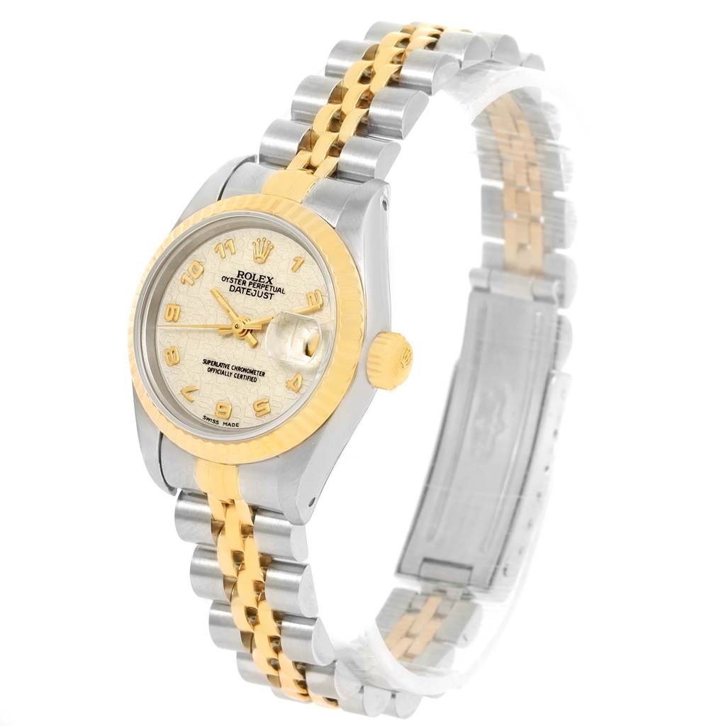The Rolex Datejust 69173 Women's Stainless Steel Beige Dial 69173 Women's Stainless Steel Beige Dial watch is shown at a slight side angle, highlighting the face, bezel, crown, and part of the bracelet.