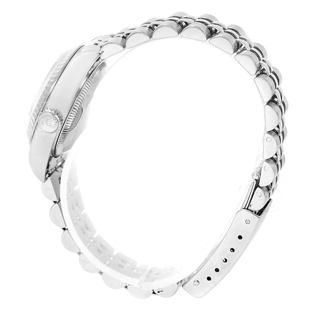 This image shows a side angle of the Rolex Datejust 69174 Women
s Stainless Steel Pink Dial 69174 Women
s Stainless Steel Pink Dial watch, highlighting the crown, case, and bracelet.