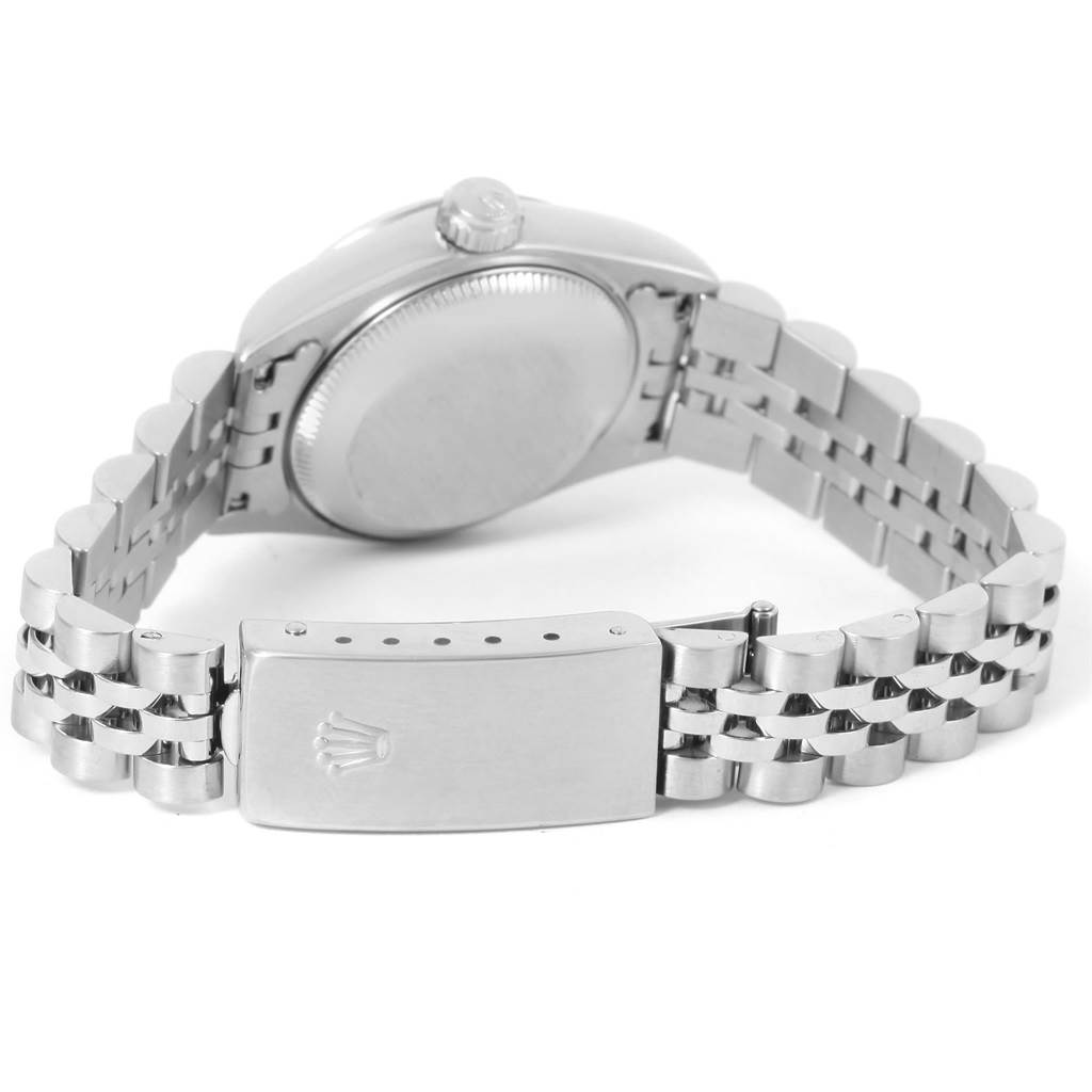 This image shows the back case and clasp of a Rolex Datejust 69174 Women
s Stainless Steel Pink Dial 69174 Women
s Stainless Steel Pink Dial watch from a rear angle.