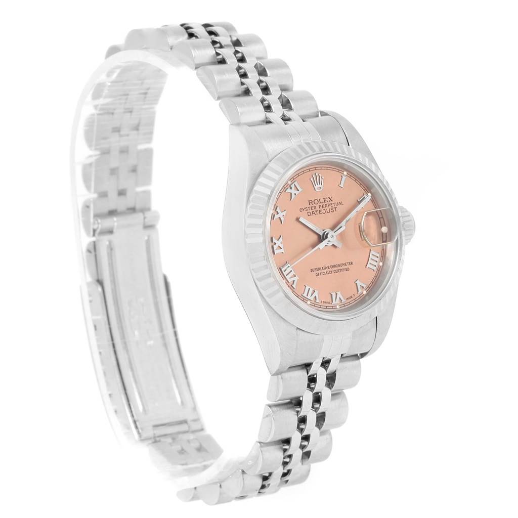 The image shows a side angle of a Rolex Datejust 69174 Women
s Stainless Steel Pink Dial 69174 Women
s Stainless Steel Pink Dial watch, highlighting its pink dial and silver bracelet.