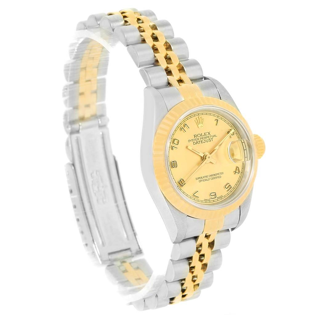 The image shows a side angle of a Rolex Datejust 69173 Women's Stainless Steel Champagne Dial 69173 Women's Stainless Steel Champagne Dial watch, featuring its gold and silver two-tone bracelet and yellow dial.