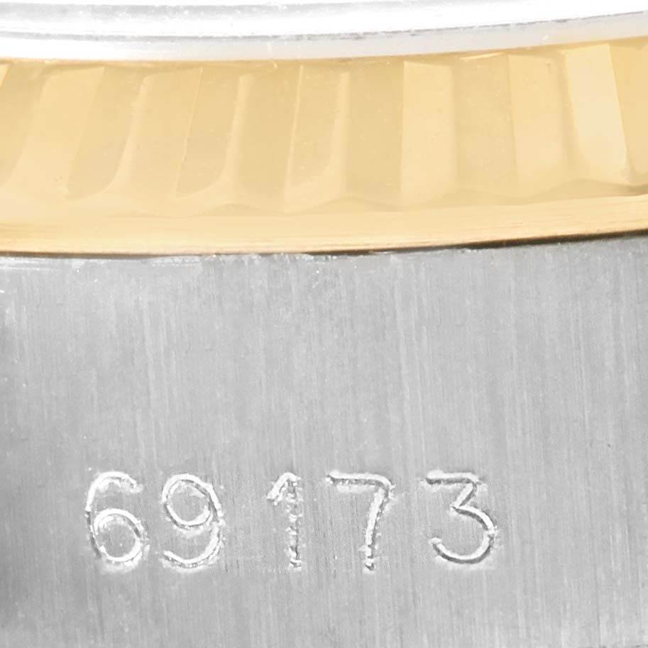 The image shows a close-up of the case and bezel with the model number "69173" of a Rolex Datejust 69173 Women's Stainless Steel White Dial 69173 Women's Stainless Steel White Dial watch.