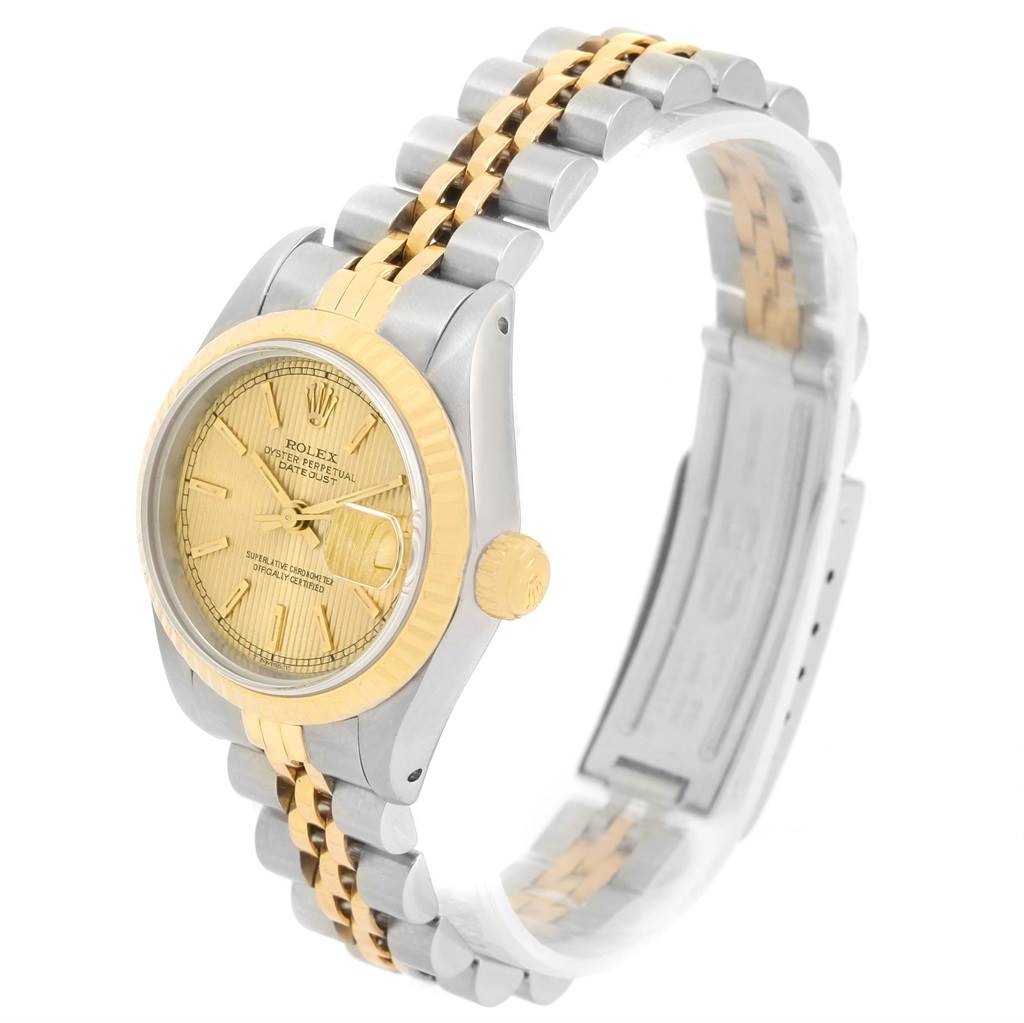 This image showcases the Rolex Datejust 69173 Women
s Stainless Steel Champagne Dial 69173 Women
s Stainless Steel Champagne Dial watch from a front diagonal angle, highlighting the face, bezel, and bracelet.