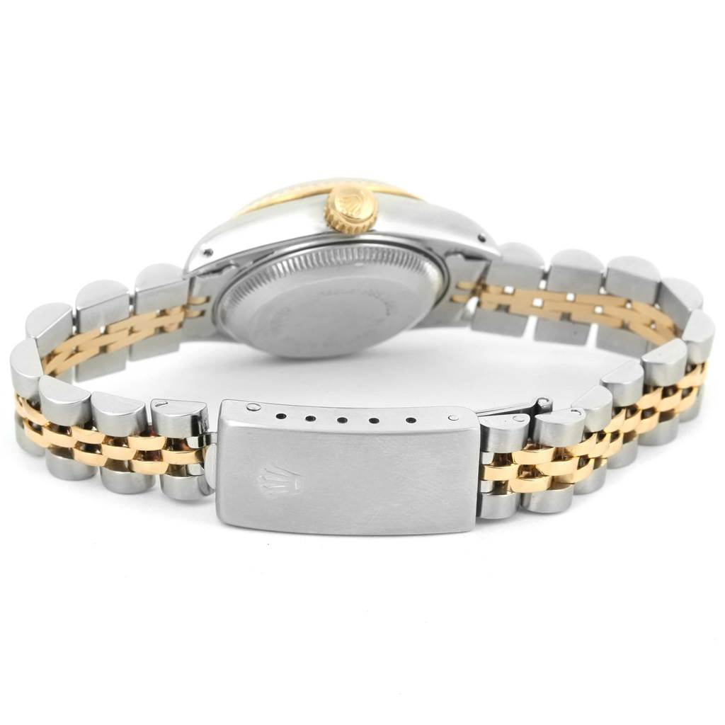 The image shows the back view of a Rolex Datejust 69173 Women
s Stainless Steel Champagne Dial 69173 Women
s Stainless Steel Champagne Dial watch, highlighting its two-tone bracelet and clasp.