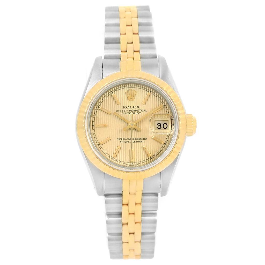 This image shows a Rolex Datejust 69173 Women
s Stainless Steel Champagne Dial 69173 Women
s Stainless Steel Champagne Dial watch with a two-tone bracelet, gold fluted bezel, and gold dial from a front angle.