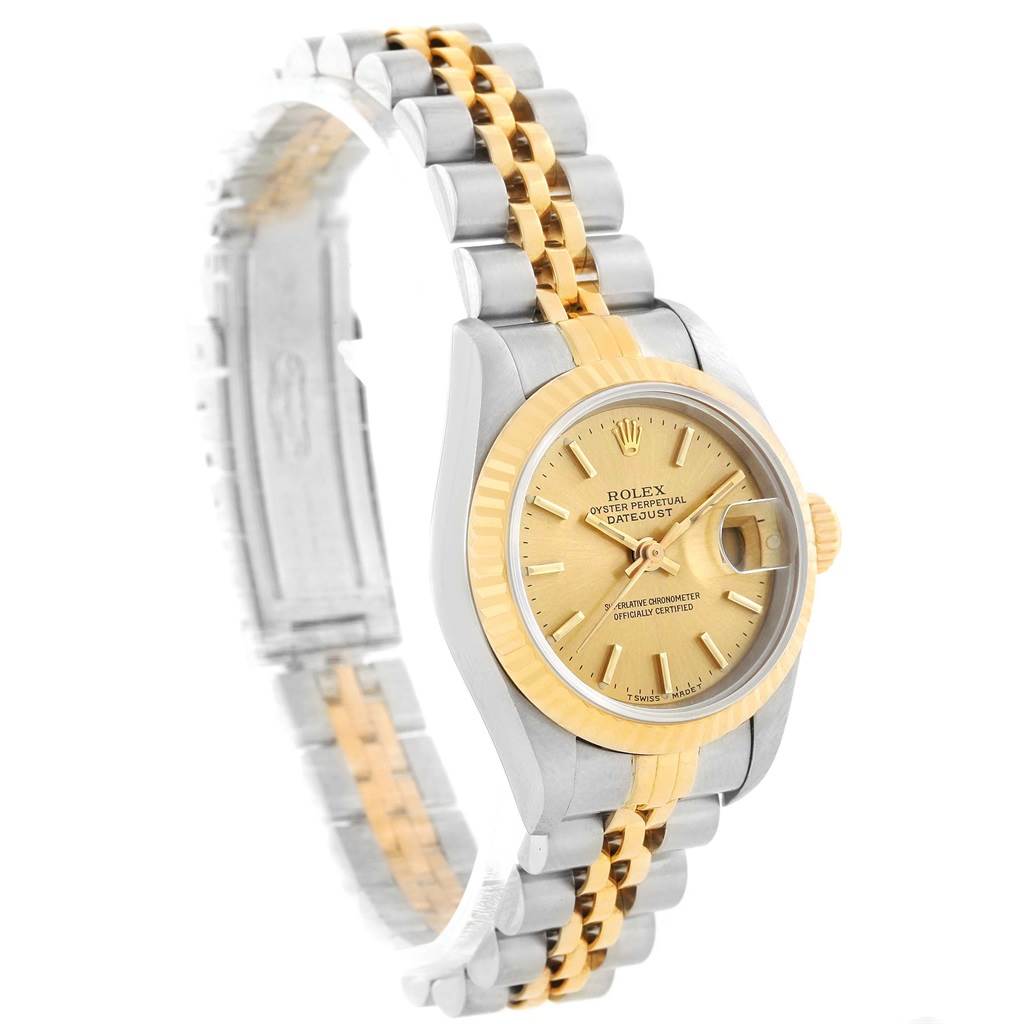 This image shows a Rolex Datejust 69173 Women's Stainless Steel Champagne Dial 69173 Women's Stainless Steel Champagne Dial from an angled side view, highlighting its face, bezel, and stainless steel and gold bracelet.