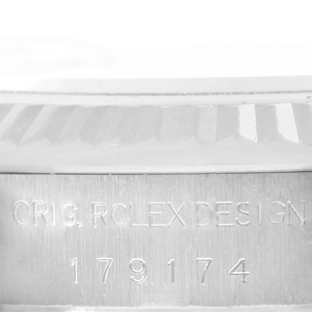 This close-up angle shows the side engraving of the Rolex Datejust 179174 Women
s Stainless Steel White Dial 179174 Women
s Stainless Steel White Dial model, including the design and model number 179174.