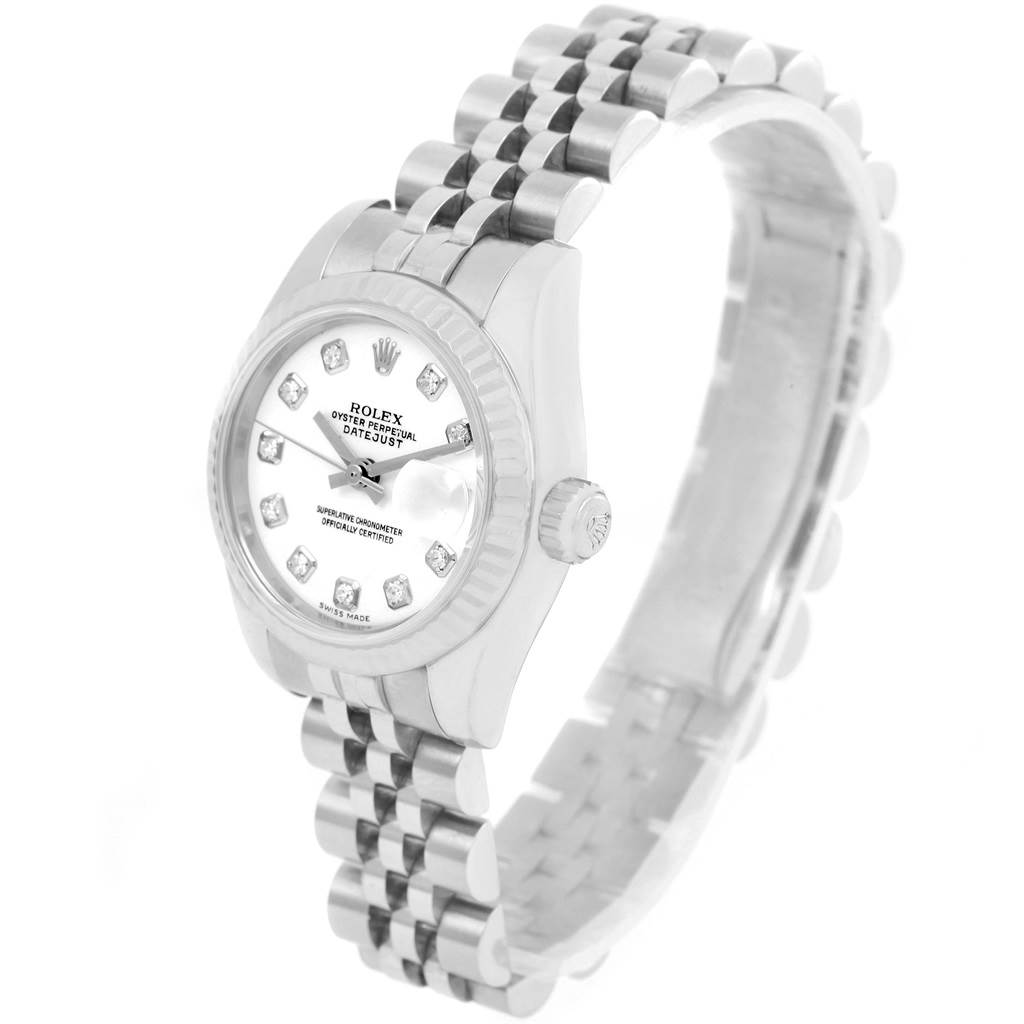 The image shows a Rolex Datejust 179174 Women
s Stainless Steel White Dial 179174 Women
s Stainless Steel White Dial watch at a high angle, featuring the face, bezel, crown, and part of the Jubilee bracelet.