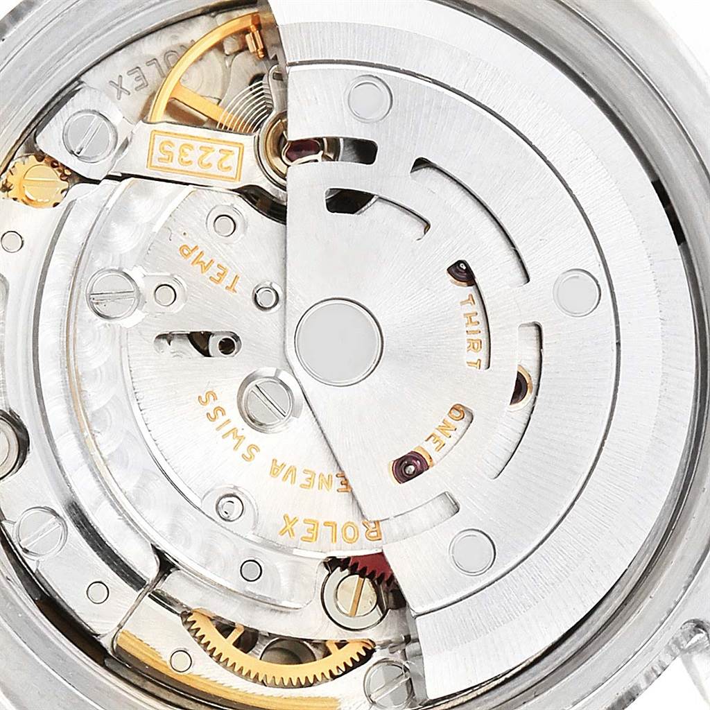 This image shows the internal mechanism of a Rolex Datejust 179174 Women
s Stainless Steel White Dial 179174 Women
s Stainless Steel White Dial watch, highlighting its movement components and engravings.