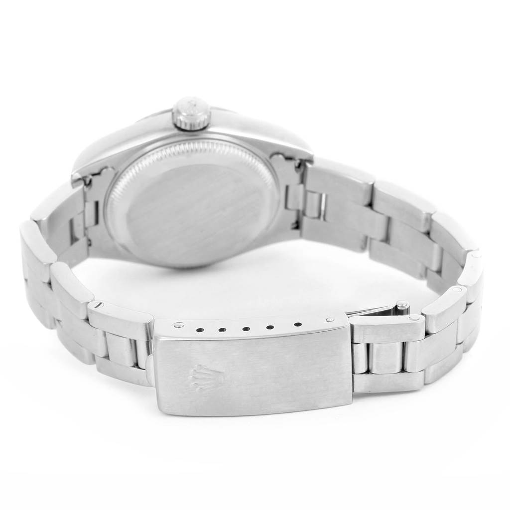 This image shows the back view of a Rolex Datejust 79174 Women's Stainless Steel Mother of Pearl Dial 79174 Women's Stainless Steel Mother of Pearl Dial watch, highlighting its case back, crown, and bracelet clasp.