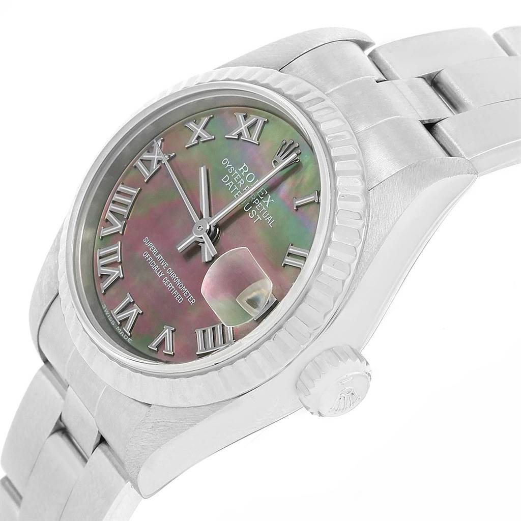 The image shows a side angle of a Rolex Datejust 79174 Women's Stainless Steel Mother of Pearl Dial 79174 Women's Stainless Steel Mother of Pearl Dial watch, highlighting its face, bezel, crown, and part of the bracelet.