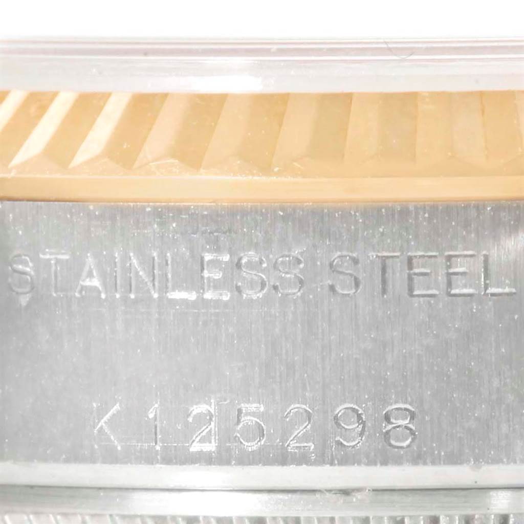 The image shows a close-up of the stainless steel case and model number engraving on the Rolex Datejust 79163 Women's Steel and Gold (two tone) Champagne Dial 79163 Women's Steel and Gold (two tone) Champagne Dial watch.