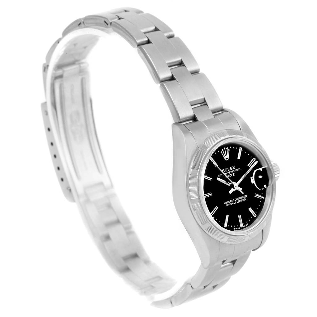 The image shows a side angle of the Rolex Datejust 79190 Women's Stainless Steel Black Dial 79190 Women's Stainless Steel Black Dial watch, highlighting its black dial, bezel, and link bracelet.