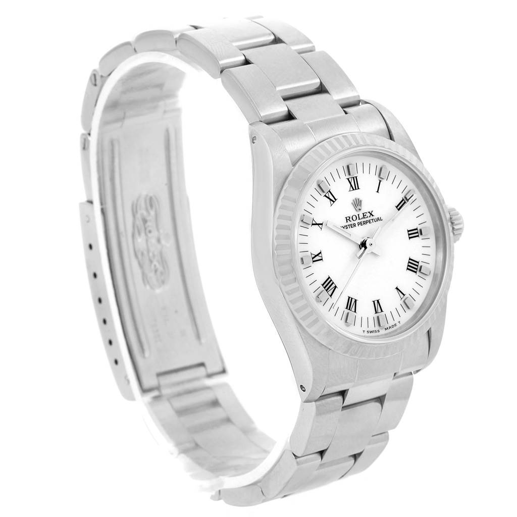 The Rolex Datejust 67514 Women's Stainless Steel White Dial 67514 Women's Stainless Steel White Dial watch is shown at a side angle, displaying the face, bezel, bracelet, and clasp.
