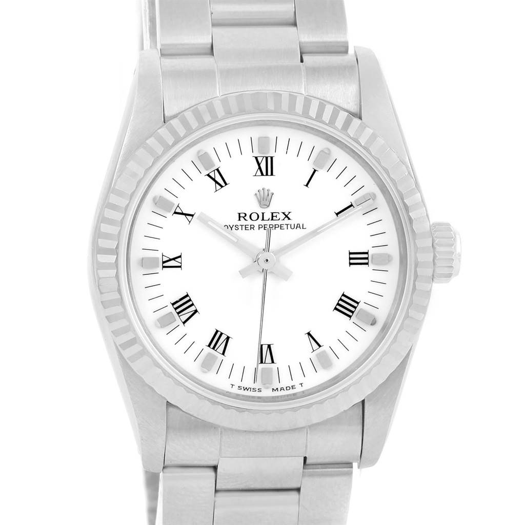 The image shows a front view of a Rolex Datejust 67514 Women's Stainless Steel White Dial 67514 Women's Stainless Steel White Dial watch, highlighting its white dial, Roman numerals, bezel, and part of the bracelet.