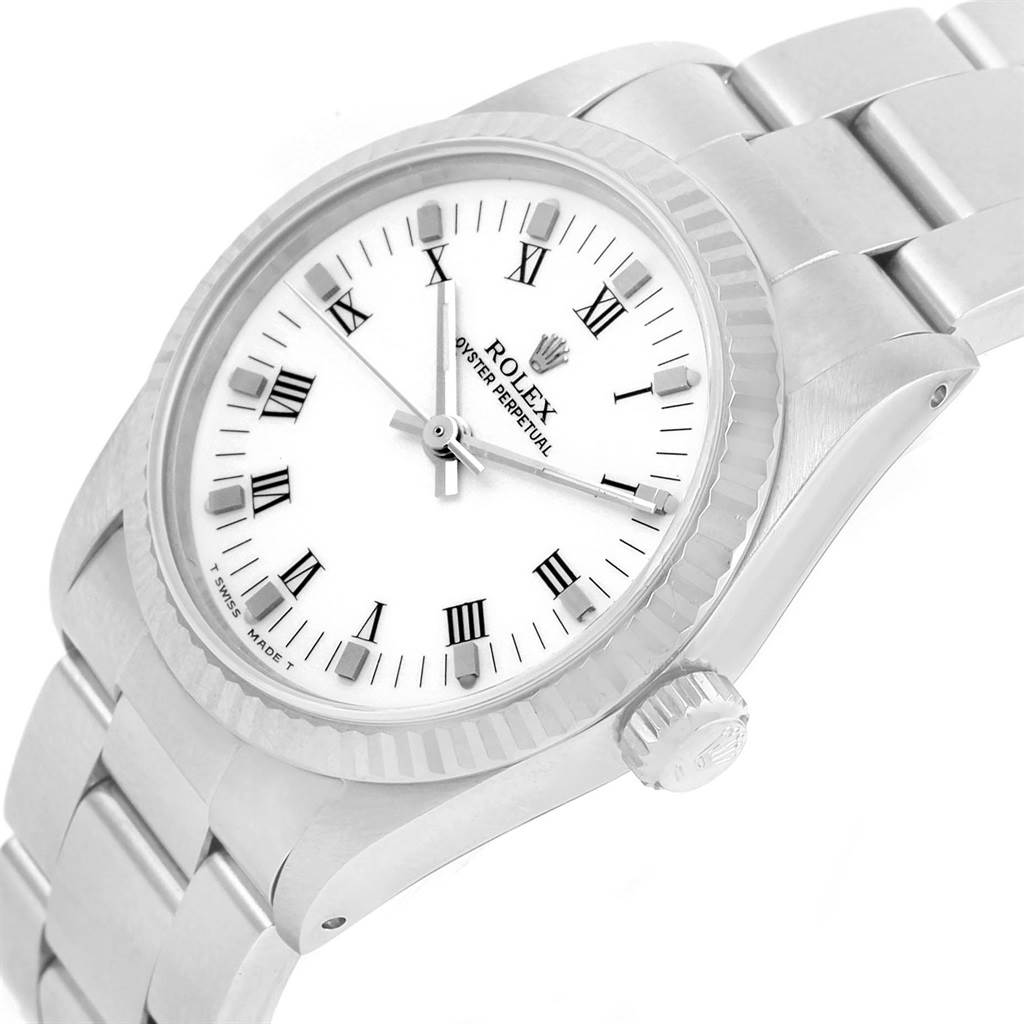The image shows a Rolex Datejust 67514 Women's Stainless Steel White Dial 67514 Women's Stainless Steel White Dial watch from an angled side view, highlighting the face, bezel, crown, and part of the bracelet.
