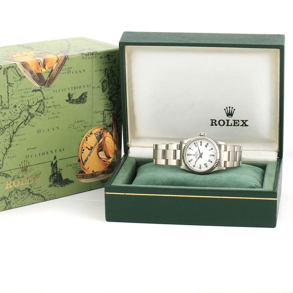 The Rolex Datejust 67514 Women's Stainless Steel White Dial 67514 Women's Stainless Steel White Dial watch is shown in an open box, displaying the face, bezel, and bracelet from a front angle.