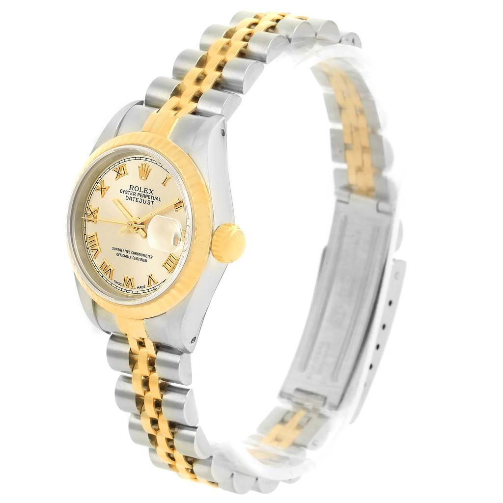 The image shows a side view of a Rolex Datejust 69173 Women
s Stainless Steel Champagne Dial 69173 Women
s Stainless Steel Champagne Dial watch, highlighting its two-tone bracelet and dial.