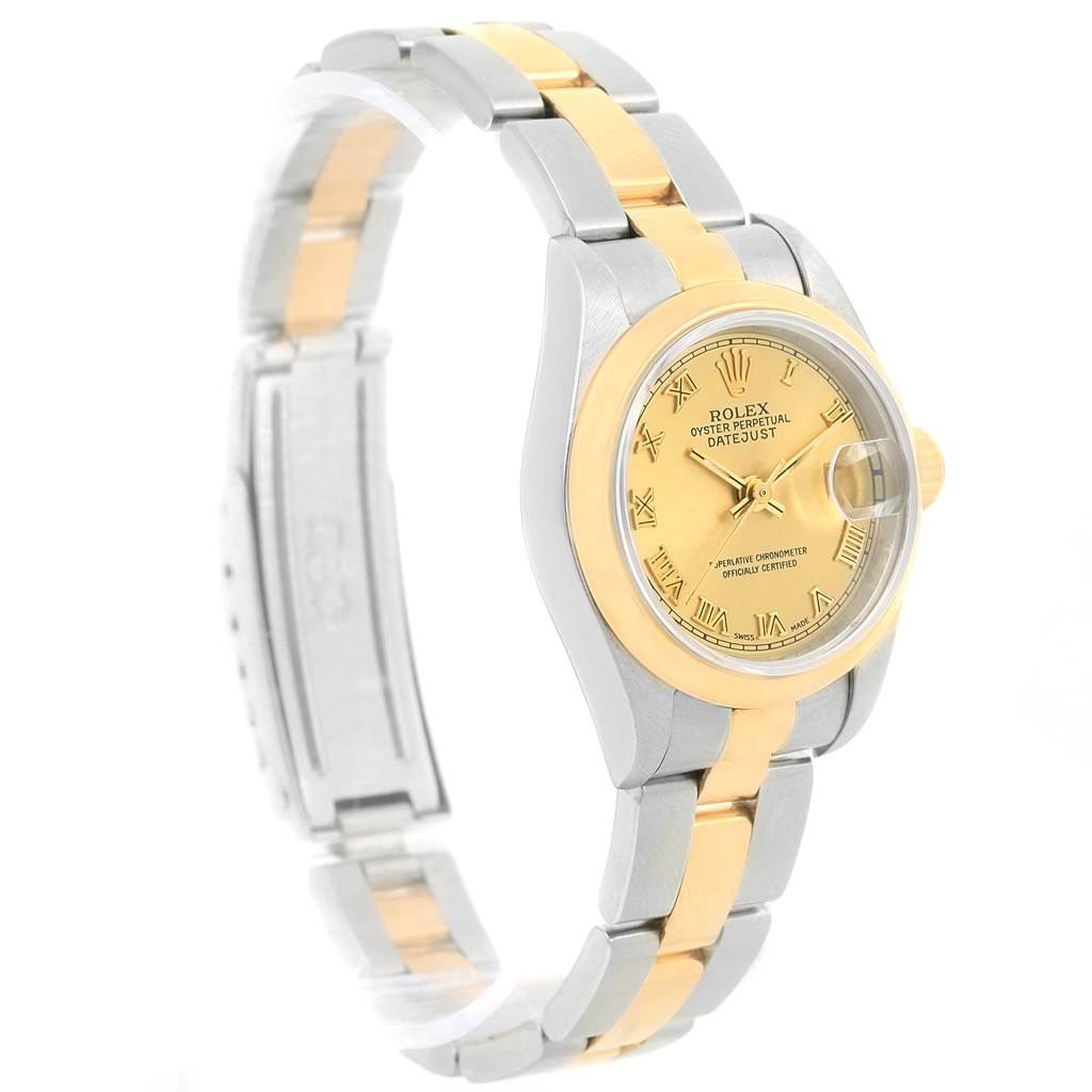 The image shows a Rolex 69163 Men
s Stainless Steel Champagne Dial 69163 Men
s Stainless Steel Champagne Dial Datejust Ladies Steel 18k Yellow Gold Roman Dial Watch 69163 taken from an angled side view, highlighting the face and bracelet.