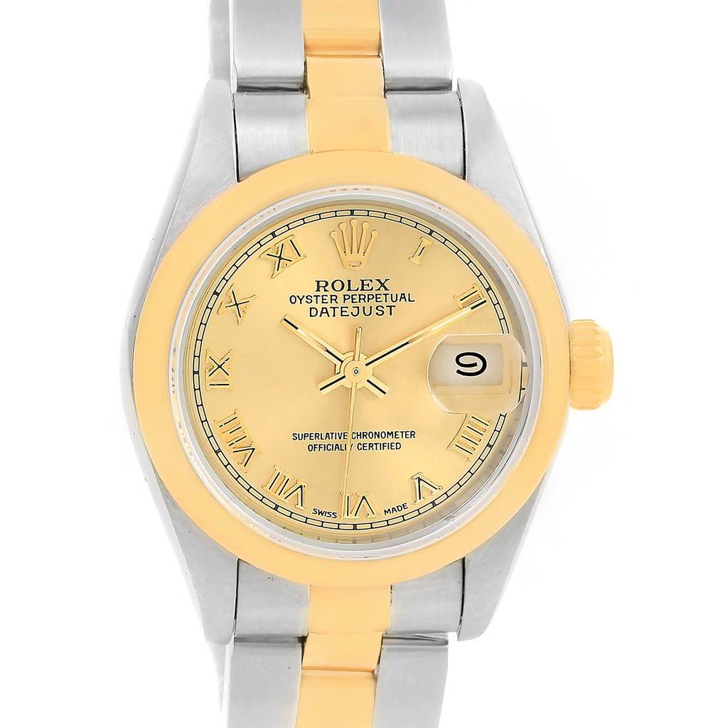 The image shows a Rolex 69163 Men
s Stainless Steel Champagne Dial 69163 Men
s Stainless Steel Champagne Dial Datejust Ladies 69163 model with a steel and 18k yellow gold casing and Roman numeral dial.