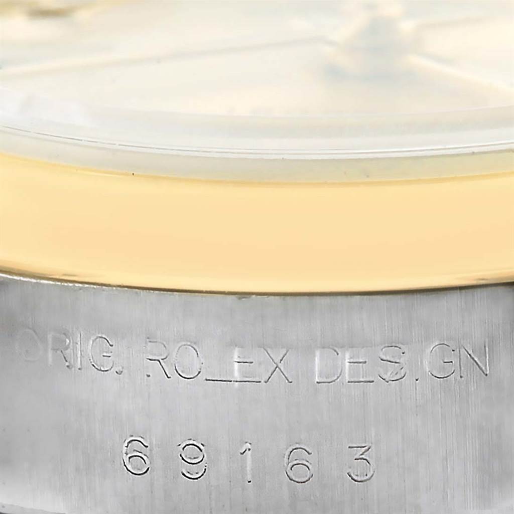 The image shows a close-up of the case edge and bezel of the Rolex 69163 Men
s Stainless Steel Champagne Dial 69163 Men
s Stainless Steel Champagne Dial Datejust Ladies Steel 18k Yellow Gold Roman Dial Watch 69163.