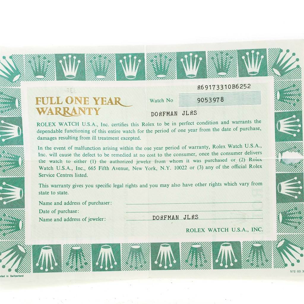 This image shows a full one-year warranty card for a Rolex Datejust 69173 Women's Stainless Steel Black Dial 69173 Women's Stainless Steel Black Dial watch.