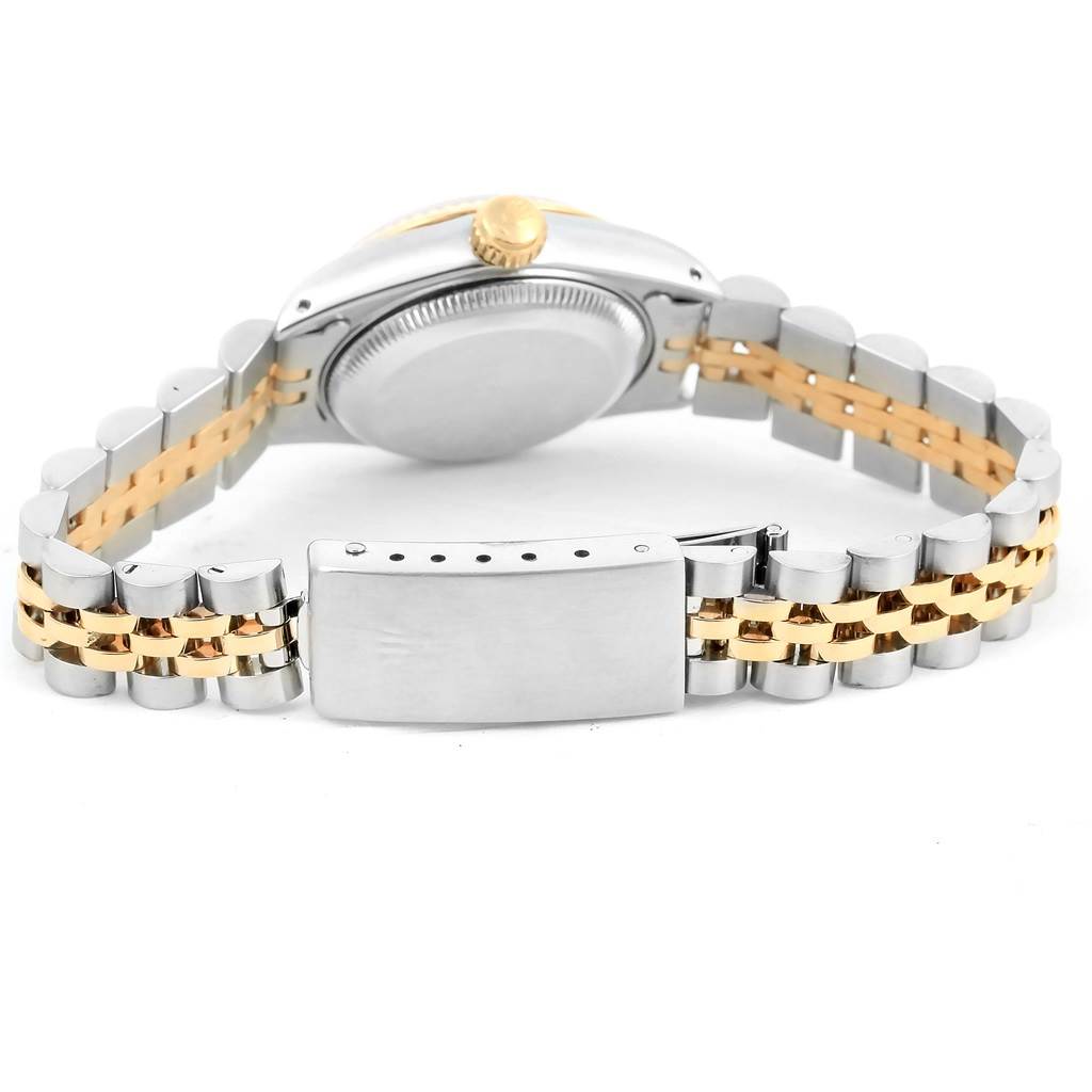 The image shows the back view of a Rolex Datejust 69173 Women's Stainless Steel Black Dial 69173 Women's Stainless Steel Black Dial watch, highlighting its case back, crown, and two-tone Jubilee bracelet with clasp.