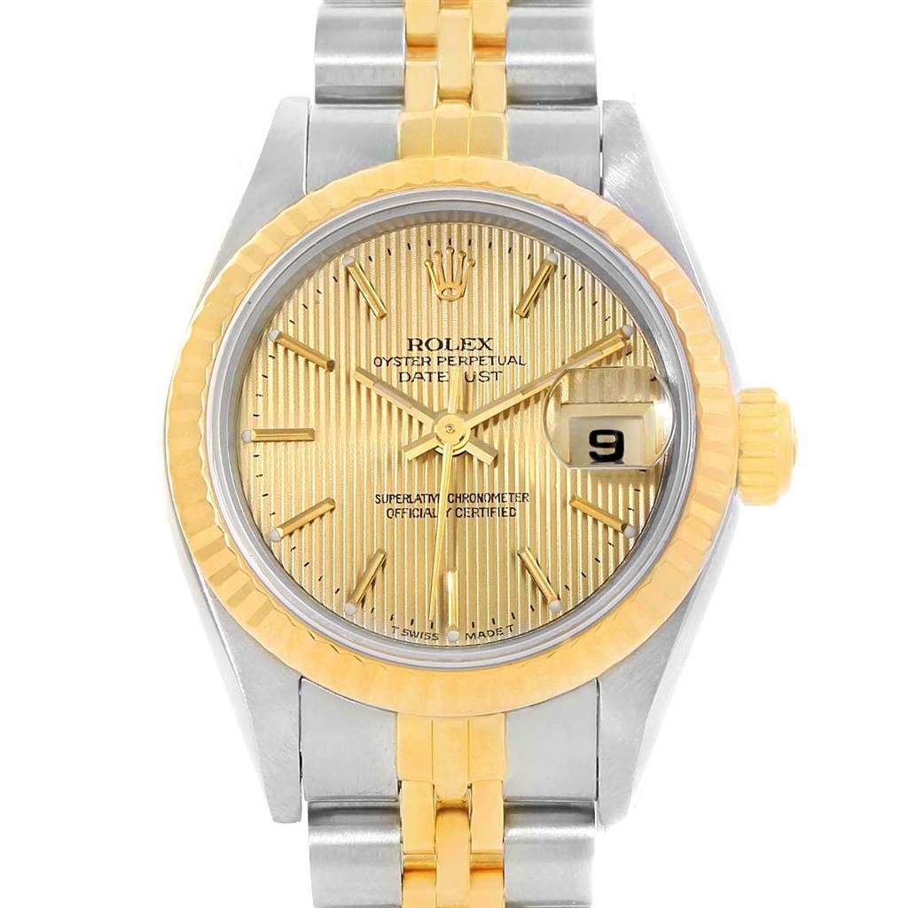 The image shows a front view of a Rolex Datejust 69173 Women
s Stainless Steel Champagne Dial 69173 Women
s Stainless Steel Champagne Dial watch with a gold and silver bracelet, gold dial, and bezel.