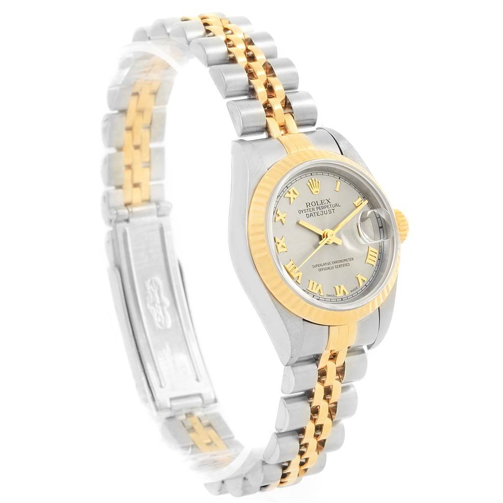 This Rolex Datejust 69173 Women
s Stainless Steel Grey Dial 69173 Women
s Stainless Steel Grey Dial watch is shown at a three-quarter angle, displaying the face, bezel, and jubilee bracelet in silver and gold.