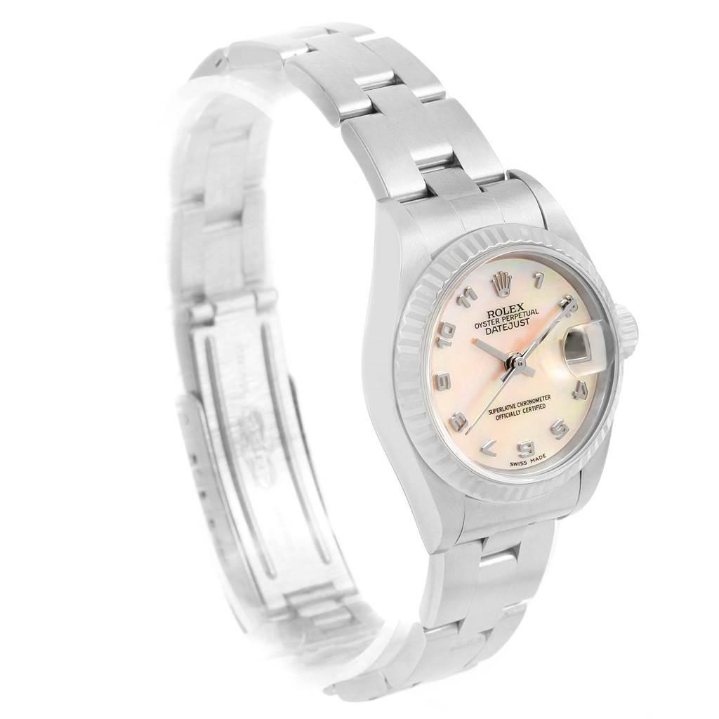 The Rolex Datejust 79174 Women's Stainless Steel Mother of Pearl Dial 79174 Women's Stainless Steel Mother of Pearl Dial watch is depicted at a slight angle, showcasing its face, bezel, crown, and linked bracelet.
