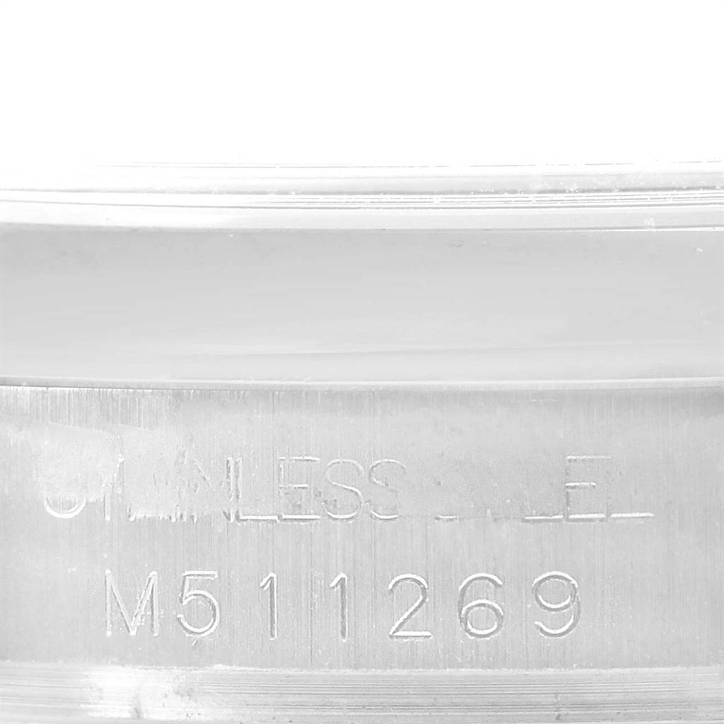 This image shows a close-up of the serial number engraved on the side of a Rolex Datejust 178240 Women
s Stainless Steel Pink Dial 178240 Women
s Stainless Steel Pink Dial watch.