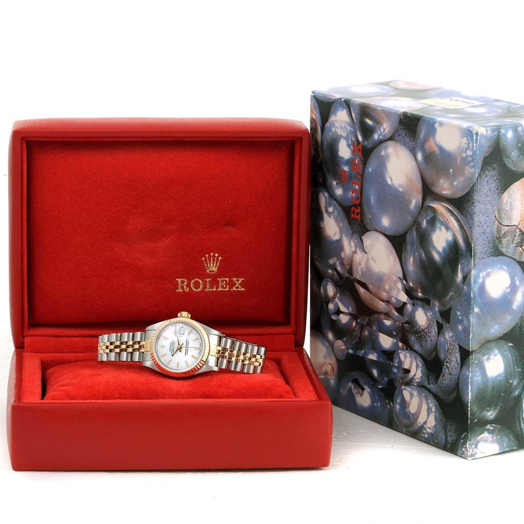 The Rolex Datejust 69173 Women's Stainless Steel White Dial 69173 Women's Stainless Steel White Dial watch is shown from the front in an open red box with its packaging visible on the side.