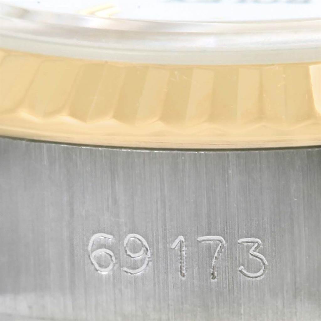 The image shows a close-up of the case with a partial view of the bezel of a Rolex Datejust 69173 Women's Stainless Steel White Dial 69173 Women's Stainless Steel White Dial model, revealing the model number 69173.
