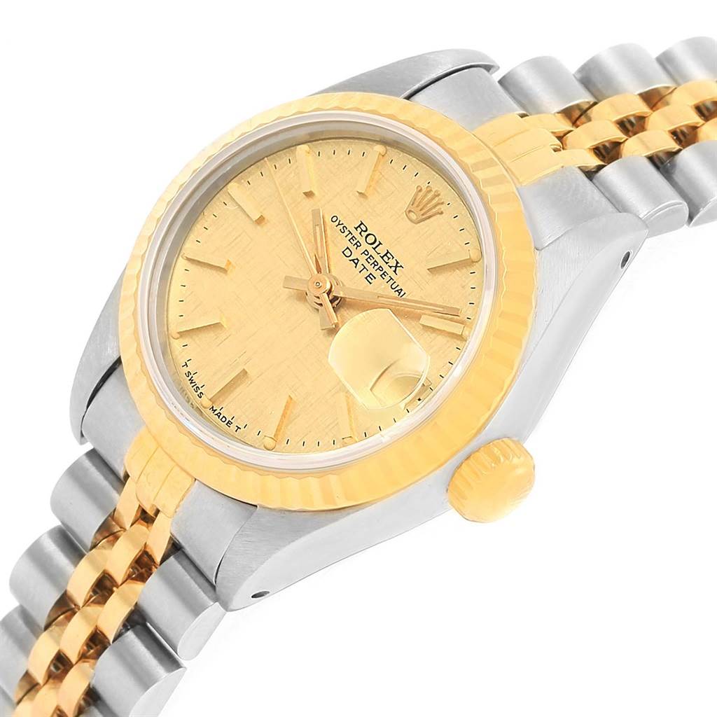 This image shows a Rolex Datejust 69173 Women
s Stainless Steel Champagne Dial 69173 Women
s Stainless Steel Champagne Dial watch at an oblique angle, highlighting its bezel, dial, crown, and bracelet.