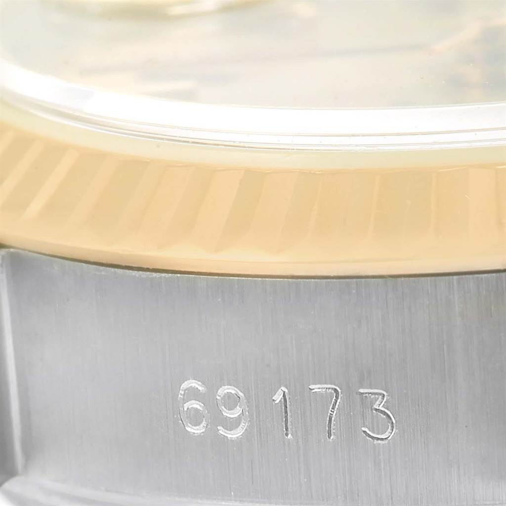 The image shows a close-up side view of the bezel and case, revealing the model number "69173" of a Rolex Datejust 69173 Women
s Stainless Steel Champagne Dial 69173 Women
s Stainless Steel Champagne Dial watch.