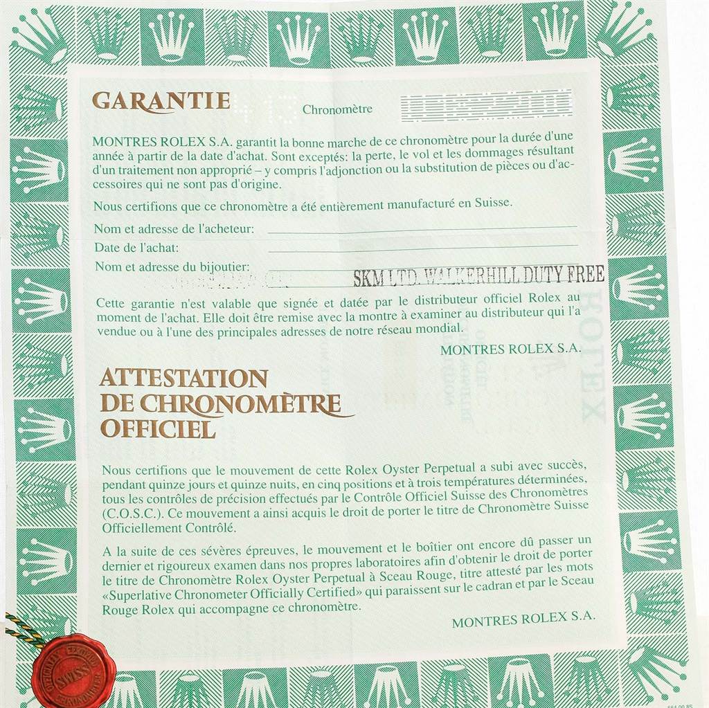 This image shows a warranty certificate and chronometer certification for the Rolex Datejust 69173 Women
s Stainless Steel Champagne Dial 69173 Women
s Stainless Steel Champagne Dial model.