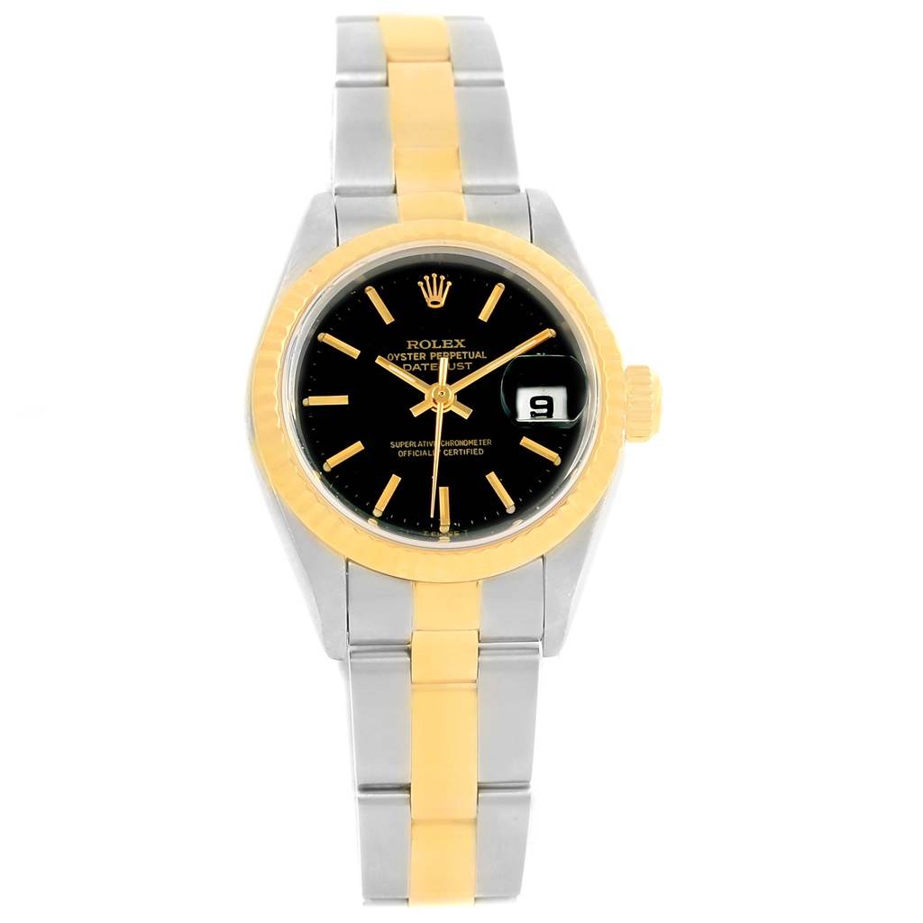 The image shows a front view of the Rolex Datejust 69173 Women
s Stainless Steel Black Dial 69173 Women
s Stainless Steel Black Dial watch, highlighting its black dial, gold bezel, and two-tone metal bracelet.