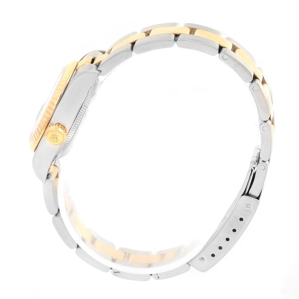 The image shows a side view of the Rolex Datejust 69173 Women
s Stainless Steel Black Dial 69173 Women
s Stainless Steel Black Dial watch, highlighting the crown, case, and two-tone bracelet.