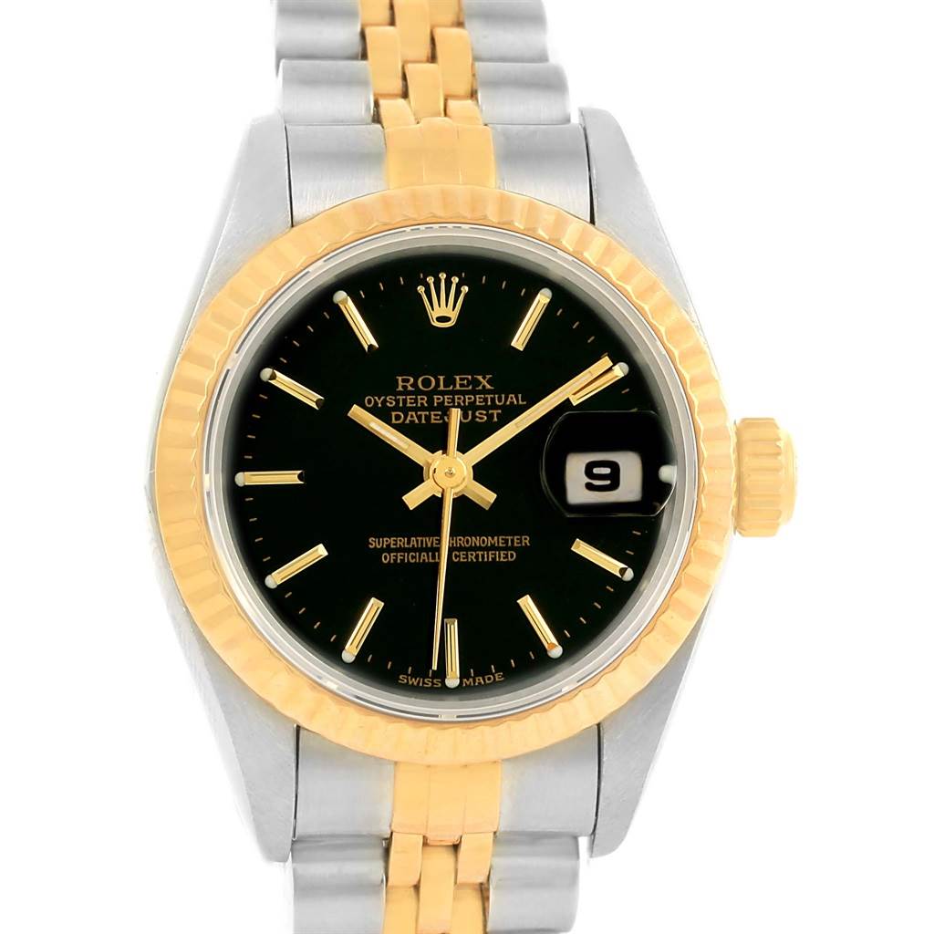 This image shows a Rolex Datejust 69173 Women's Stainless Steel Black Dial 69173 Women's Stainless Steel Black Dial watch, featuring a black dial, fluted bezel, and two-tone bracelet from a front angle.