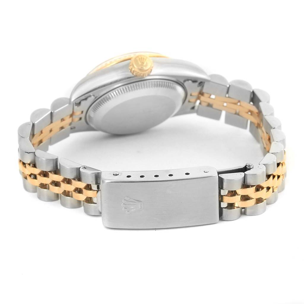 The image shows the back view of a Rolex Datejust 69173 Women's Stainless Steel Black Dial 69173 Women's Stainless Steel Black Dial watch, focusing on its clasp, bracelet, and caseback.