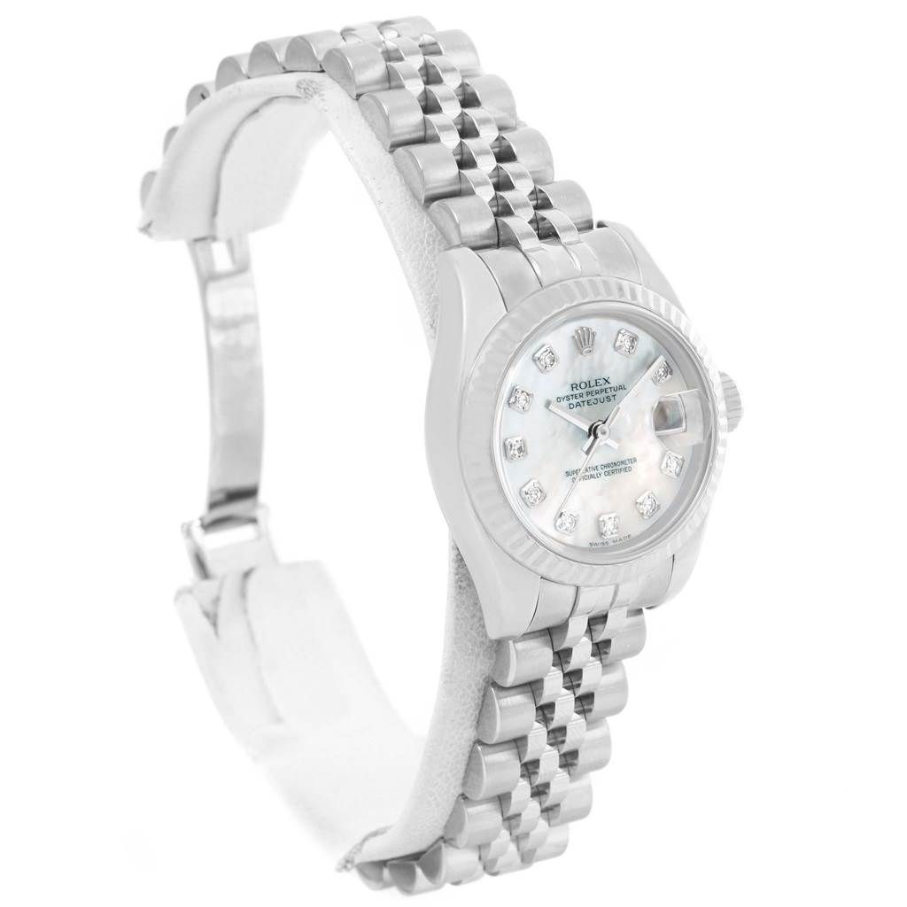 The Rolex Datejust 179174 Women
s Stainless Steel Mother of Pearl Dial 179174 Women
s Stainless Steel Mother of Pearl Dial watch is shown at an angled view displaying its face, bezel, and jubilee bracelet.