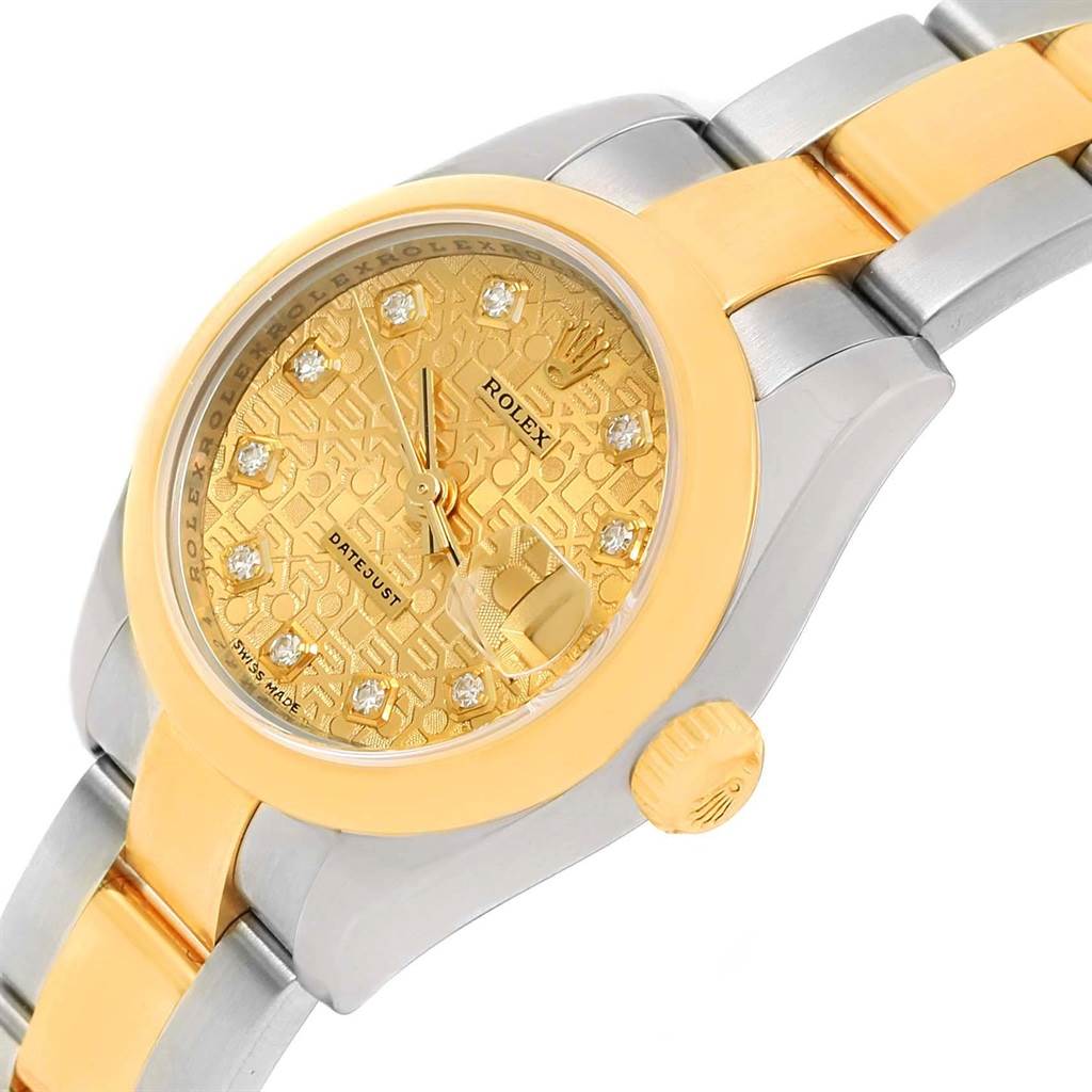 The Rolex Datejust 179163 Women's Steel and Gold (two tone) Champagne Dial 179163 Women's Steel and Gold (two tone) Champagne Dial watch is shown at a tilted angle, highlighting its gold dial with diamond hour markers and two-tone bracelet.