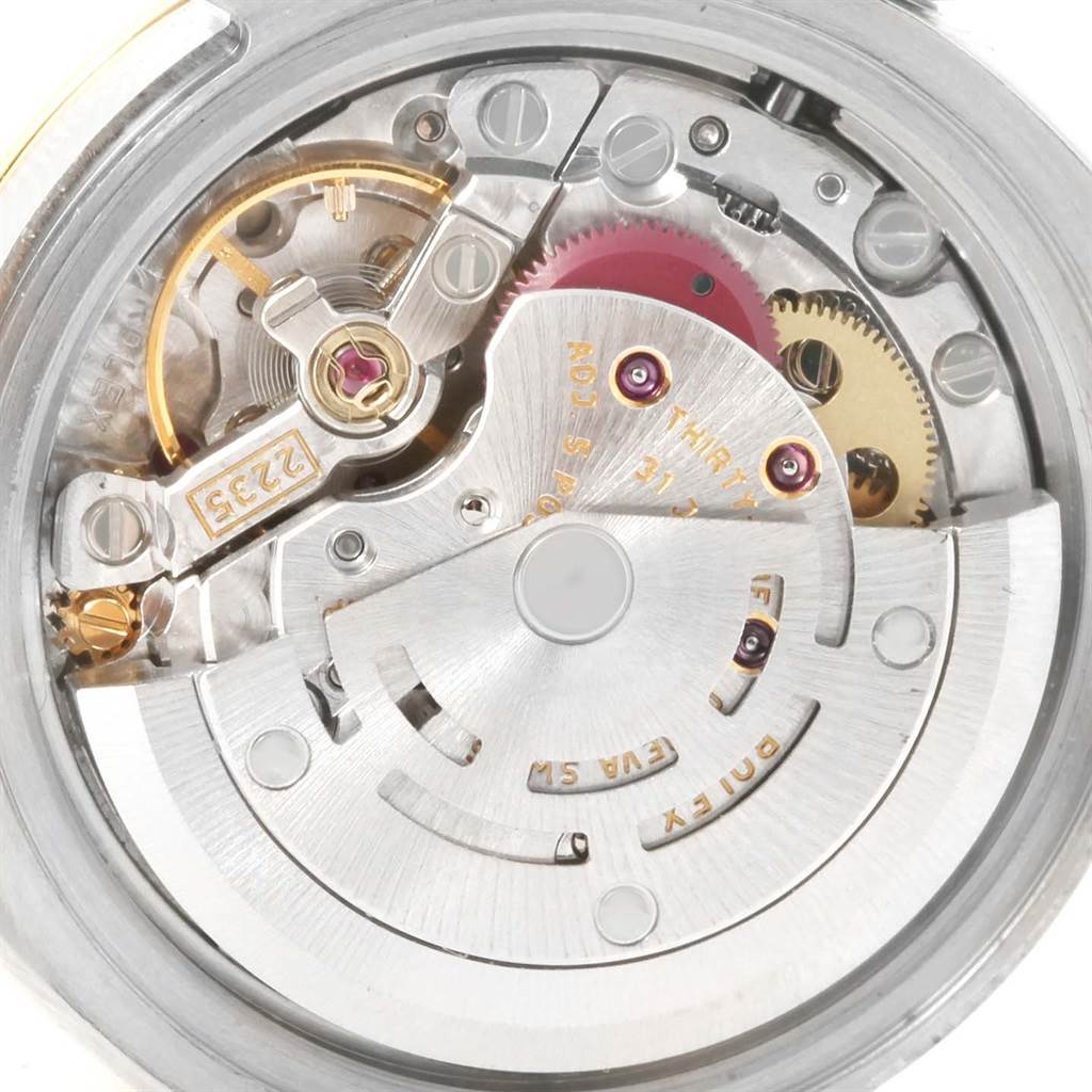 This image displays the internal mechanical movement of a Rolex Datejust 179163 Women's Steel and Gold (two tone) Champagne Dial 179163 Women's Steel and Gold (two tone) Champagne Dial watch from a rear angle.