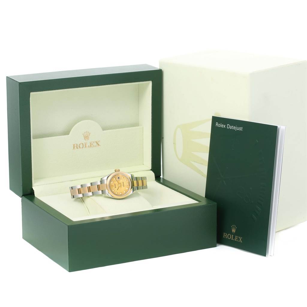 The image shows a Rolex Datejust 179163 Women's Steel and Gold (two tone) Champagne Dial 179163 Women's Steel and Gold (two tone) Champagne Dial watch inside its open green box, next to the user manual and outer packaging box.