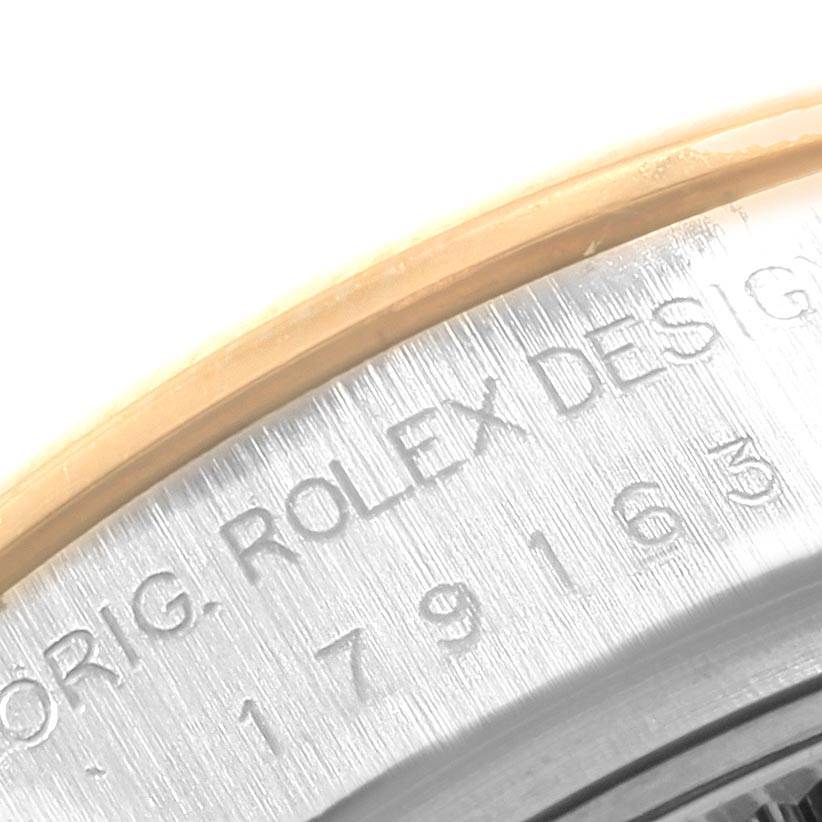 This image shows a close-up of the engraved case back of a Rolex Datejust 179163 Women's Steel and Gold (two tone) Mother of Pearl Dial 179163 Women's Steel and Gold (two tone) Mother of Pearl Dial watch, including part of the model number.