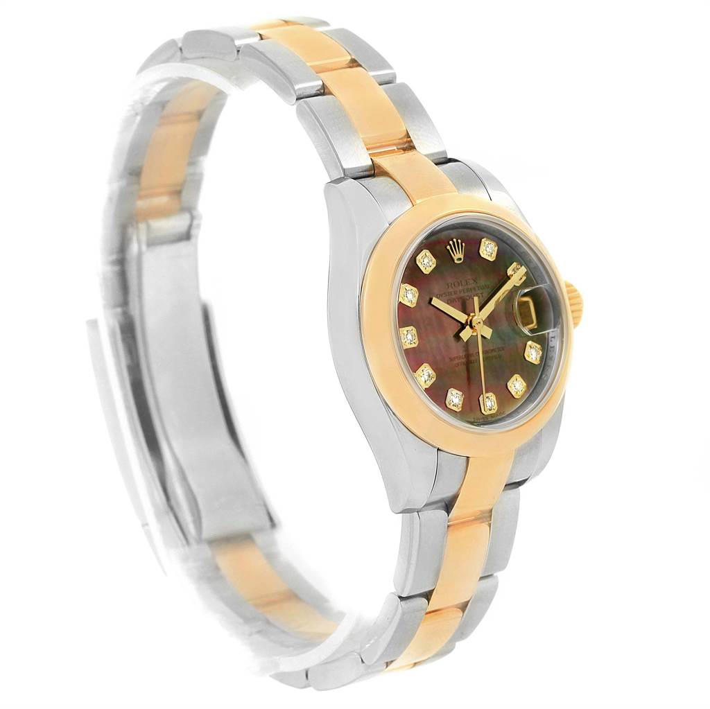 This image shows a side angle of a Rolex Datejust 179163 Women's Steel and Gold (two tone) Mother of Pearl Dial 179163 Women's Steel and Gold (two tone) Mother of Pearl Dial model, highlighting its dial, bezel, and two-tone bracelet.